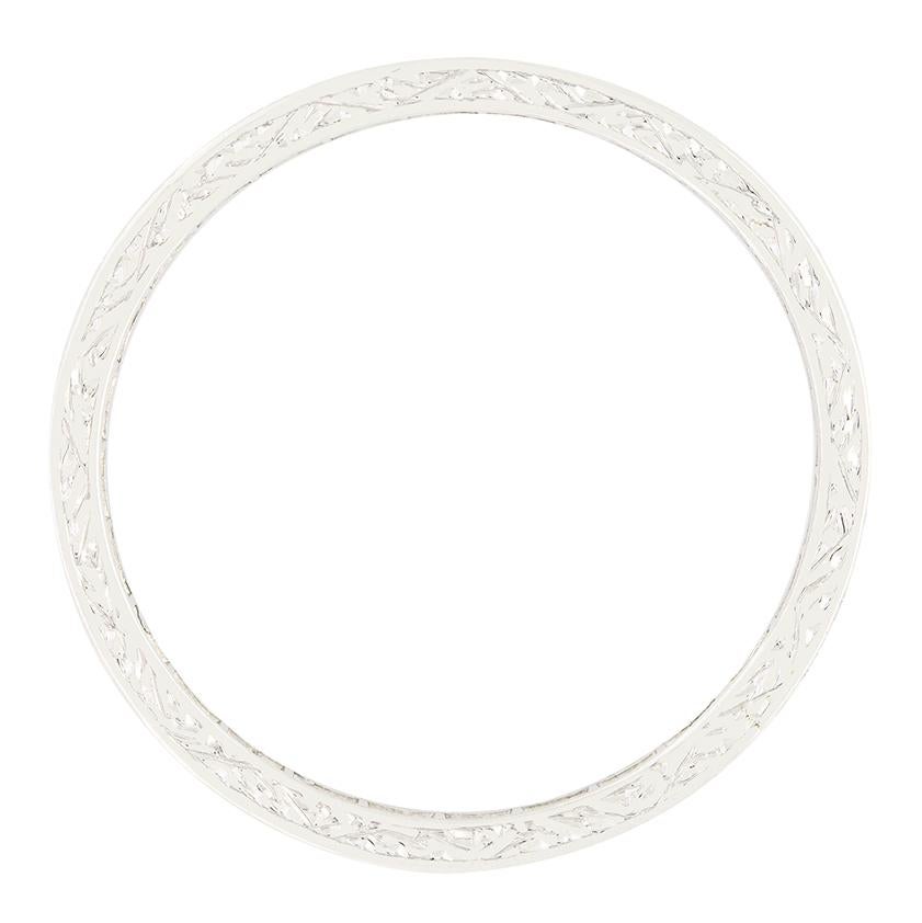 A total of twenty eight glittering diamonds adorn this beautiful eternity ring dating back to the Art Deco period. The eight cut diamonds, totalling 0.56 carat are all grain set into the platinum band. The stones range in colour from G to H and