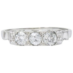 Art Deco 0.57 Carat Diamond 18 Karat White Gold Three Stone Band Ring