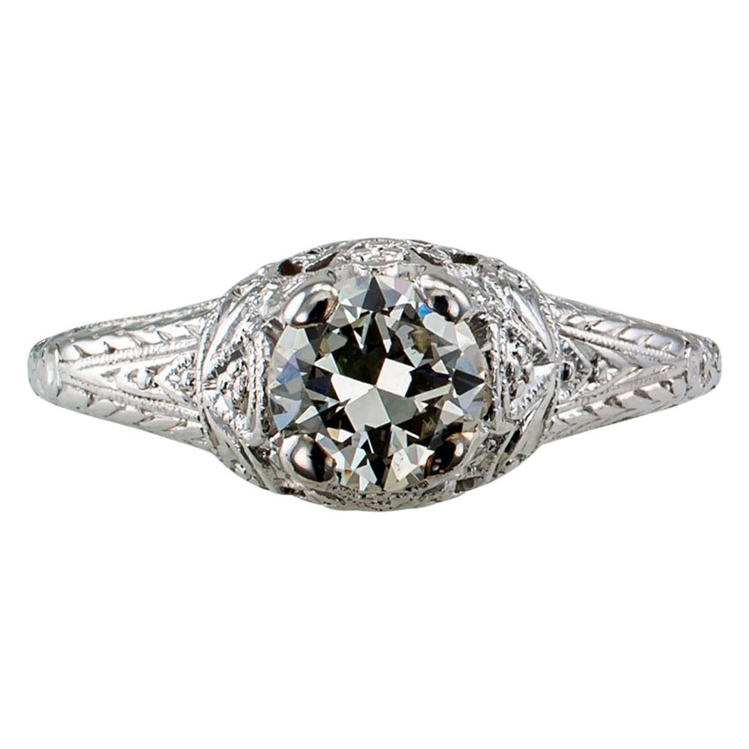 Art Deco 0.57 carat diamond solitaire engagement ring mounted in platinum circa 1925. Showcasing a transitional-cut diamond weighing 0.57 carat, accompanied by a report from EGL-USA stating that the diamond is I color and VS1 clarity, set in a