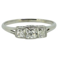 Art Deco 0.60 Carat Cushion-Cut Diamond Three-Stone Ring