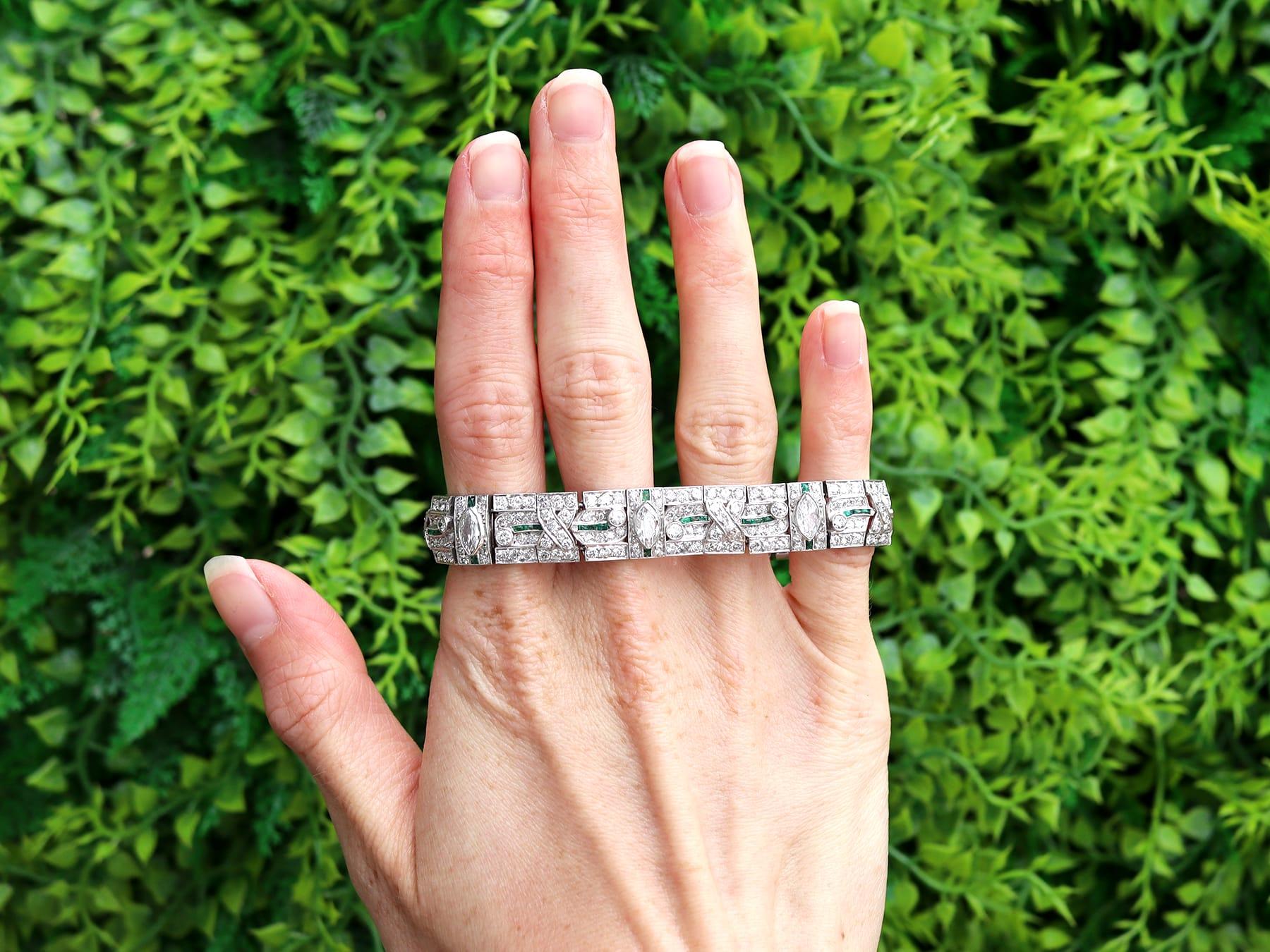 A stunning, fine and impressive antique Art Deco 0.60 carat emerald, 10.47 carat diamond and platinum bracelet; part of our diverse antique Art Deco jewelry collections.

This stunning, fine and impressive Art Deco bracelet has been crafted in