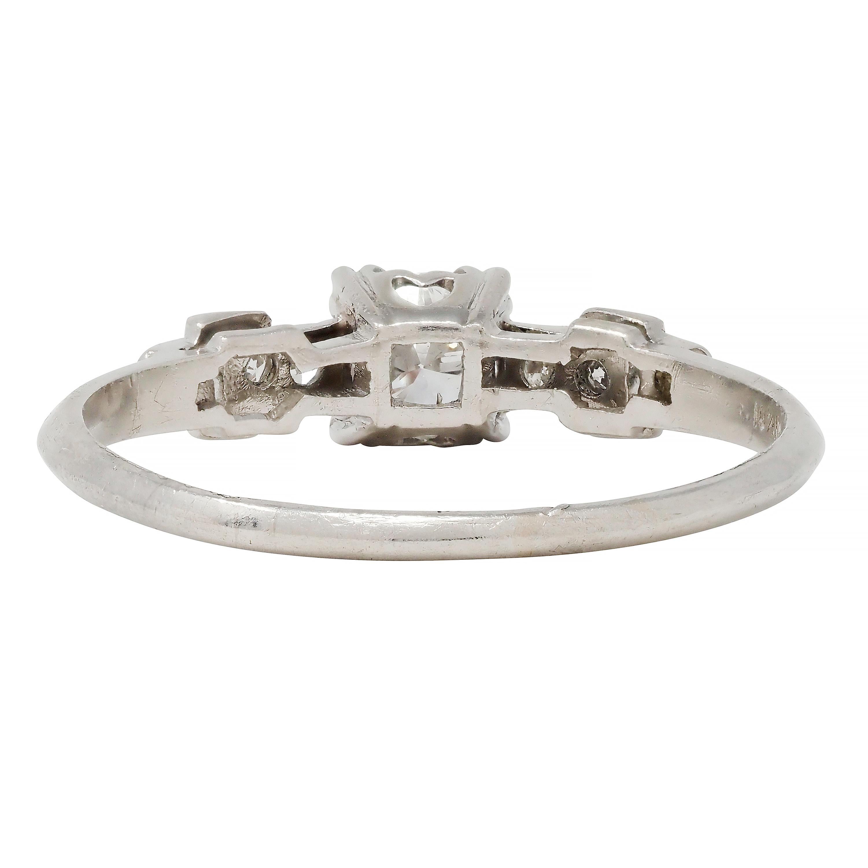 Women's or Men's Art Deco 0.60 CTW Diamond Platinum Heart Buckle Vintage Engagement Ring For Sale