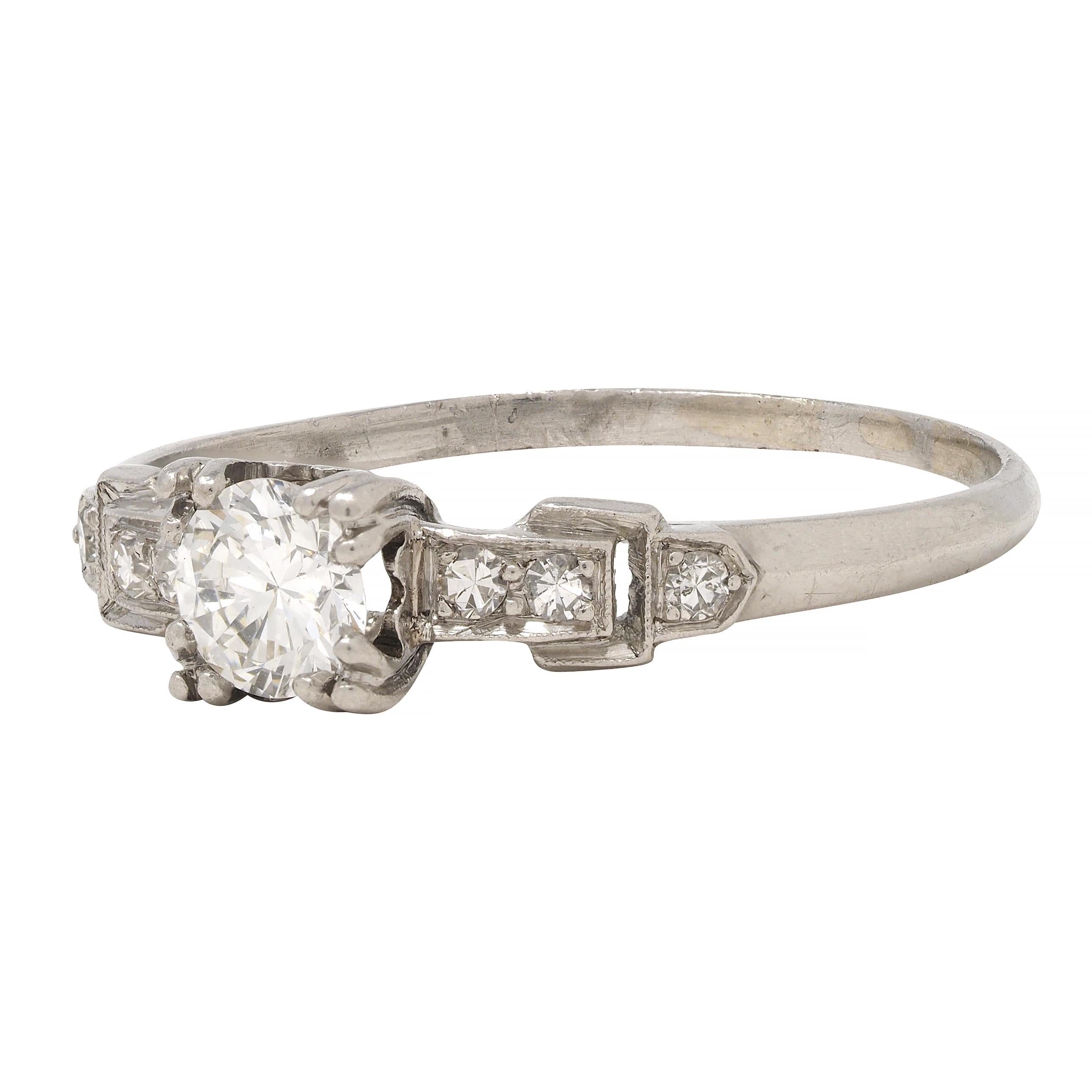 Art Deco 0.60 CTW Diamond Platinum Heart Buckle Vintage Engagement Ring For Sale 2