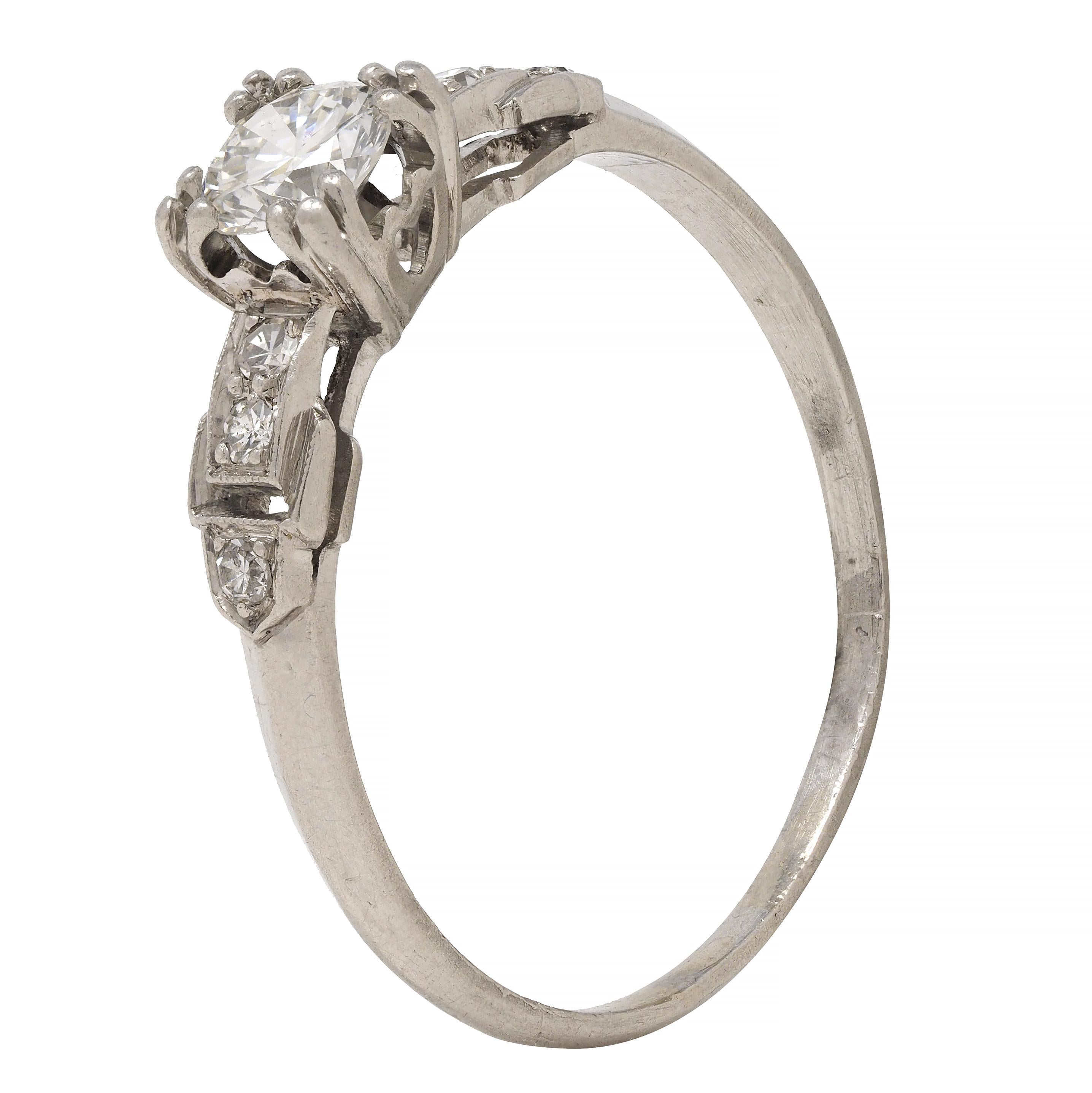 Art Deco 0.60 CTW Diamond Platinum Heart Buckle Vintage Engagement Ring For Sale 4