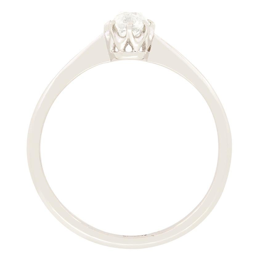 This 1920s solitaire ring is timelessly elegant, showcasing a 0.60 carat old oval cut diamond at it’s centre. The diamond is claw set in 18 carat white gold allowing it to truly sparkle. The stone is of high quality with a colour of G and clarity of