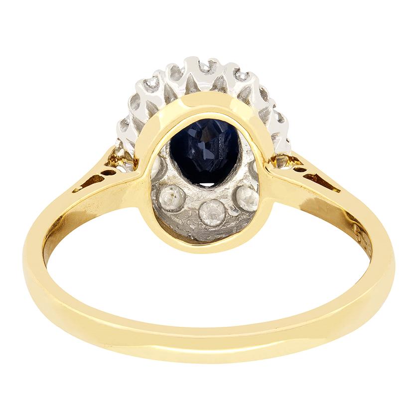 Oval Cut Art Deco 0.60ct Sapphire and Diamond Cluster Ring, c.1920s For Sale