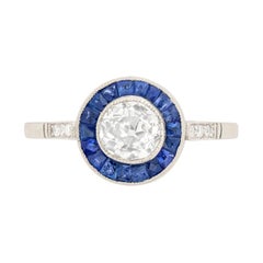 Antique Art Deco 0.62 Carat Diamond and Sapphire Target Ring, circa 1920s