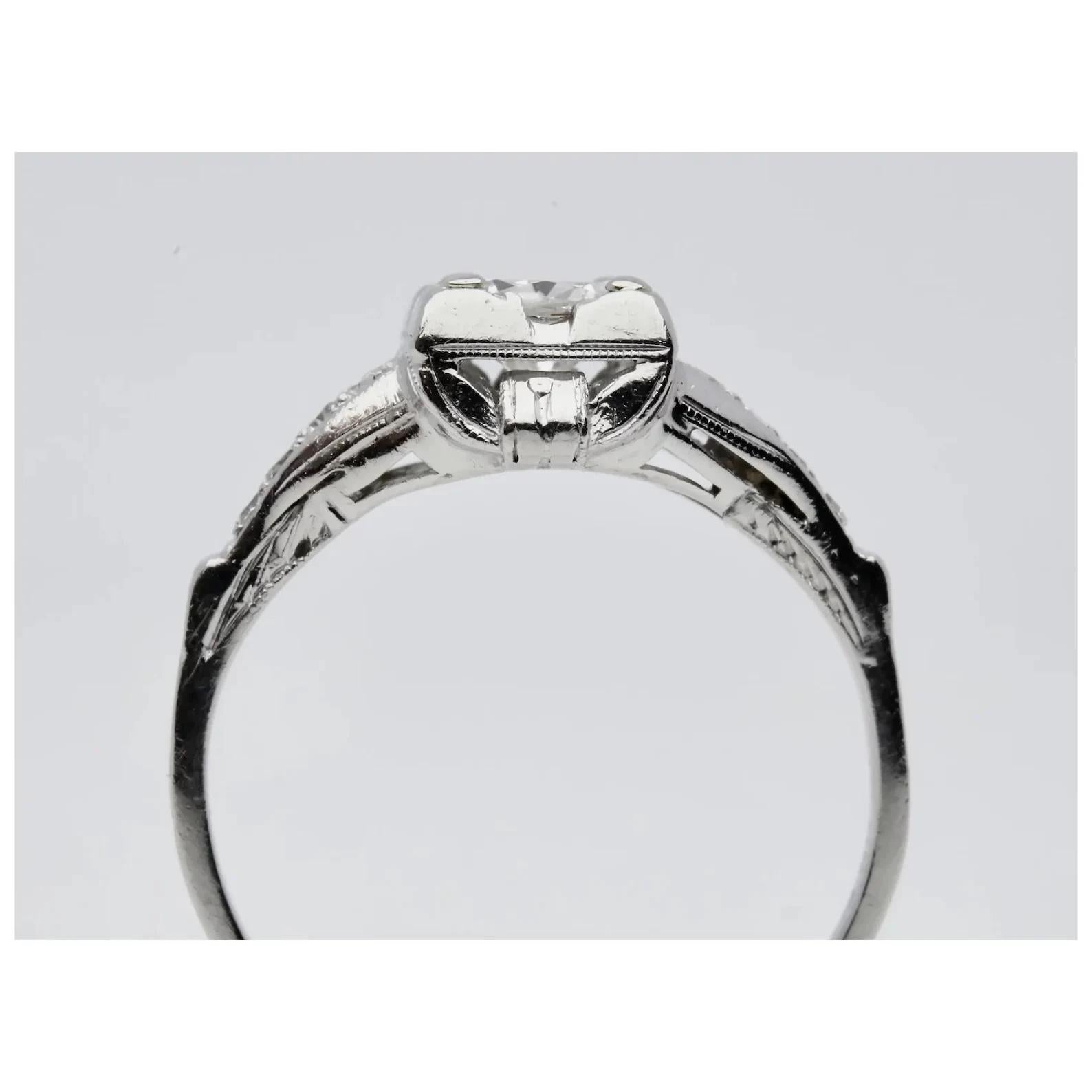Art Deco 0.63CTW Diamond Hand Engraved Engagement Ring in Platinum In Good Condition For Sale In Boston, MA