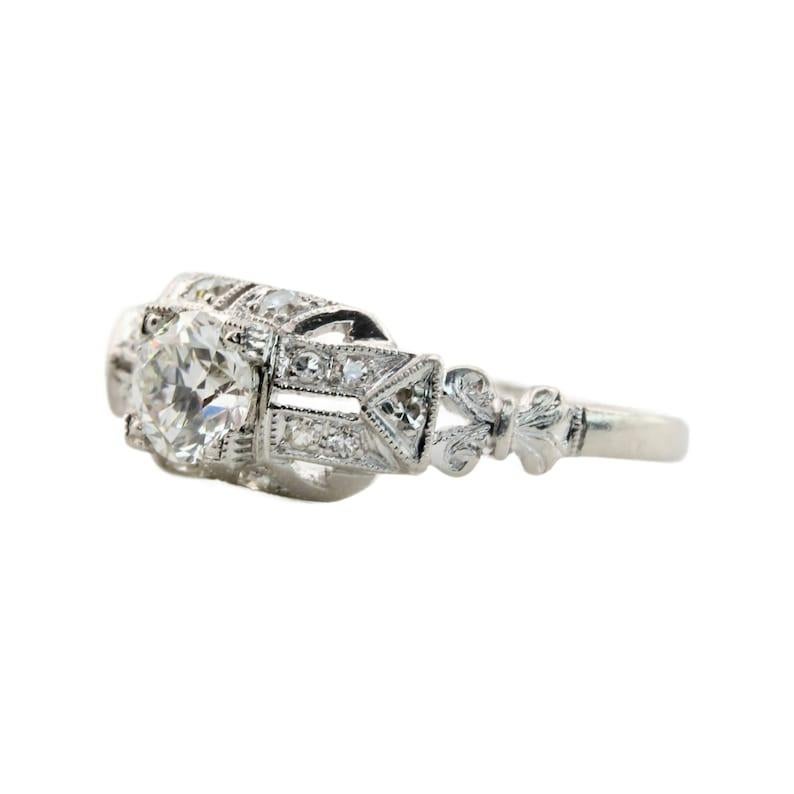 Old European Cut Art Deco 0.64 CTW Diamond Engagement Ring in Platinum with Milgrain Detailing For Sale