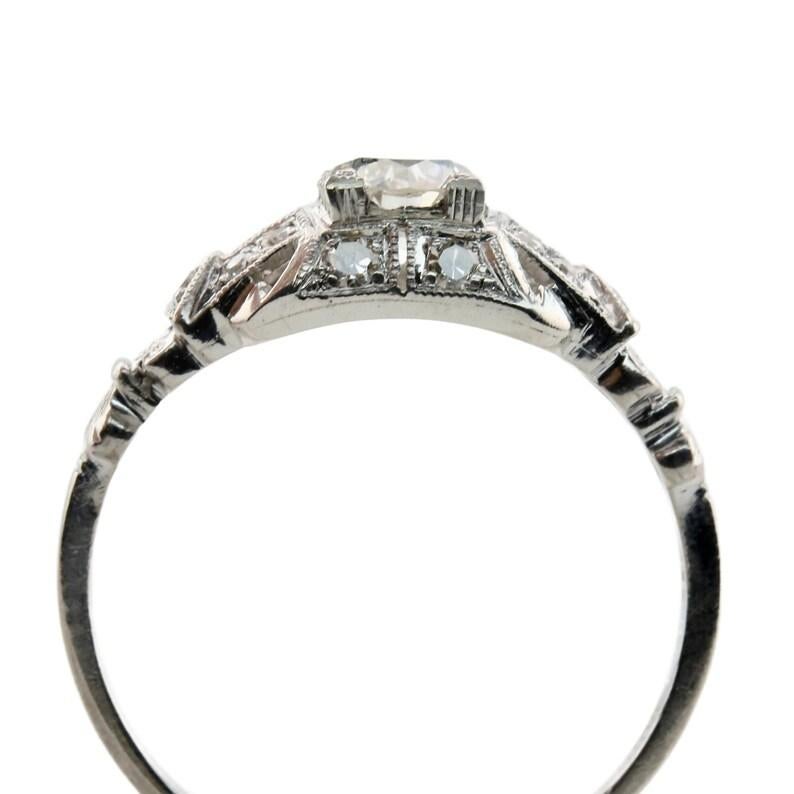 Art Deco 0.64 CTW Diamond Engagement Ring in Platinum with Milgrain Detailing In Good Condition For Sale In Boston, MA