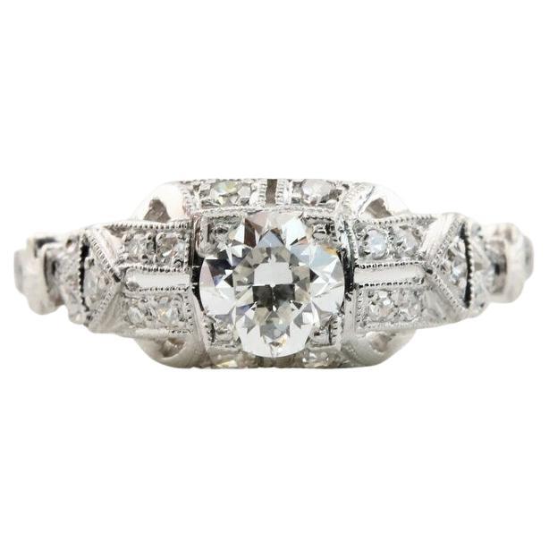 Art Deco 0.64 CTW Diamond Engagement Ring in Platinum with Milgrain Detailing For Sale