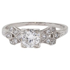 Art Deco 0.64 CTW Transitional Cut Diamond Platinum Buckle Engagement Ring