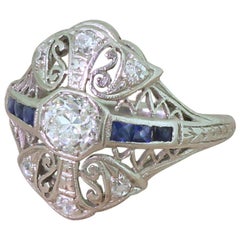 Art Deco 0.65 Carat Old Cut Diamond and Sapphire Platinum Ring