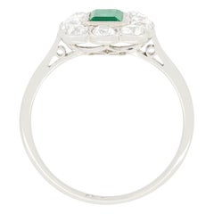 Art Deco 0.65ct Emerald and Diamond Cluster Ring, c.1920s