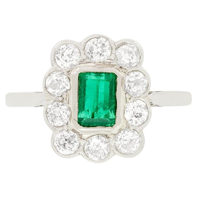 Art Deco 0.65ct Emerald and Diamond Cluster Ring, c.1920s For Sale