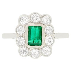 Art Deco 0.65ct Emerald and Diamond Cluster Ring, c.1920s