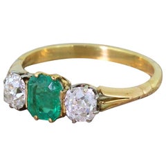 Art Deco 0.67 Carat Emerald & 0.90 Carat Old Cut Diamond Trilogy Ring circa 1920