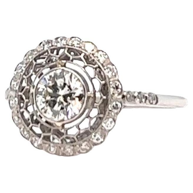 Art Deco Style 0.70 Carat Diamond Platinum Halo Filigree Ring For Sale