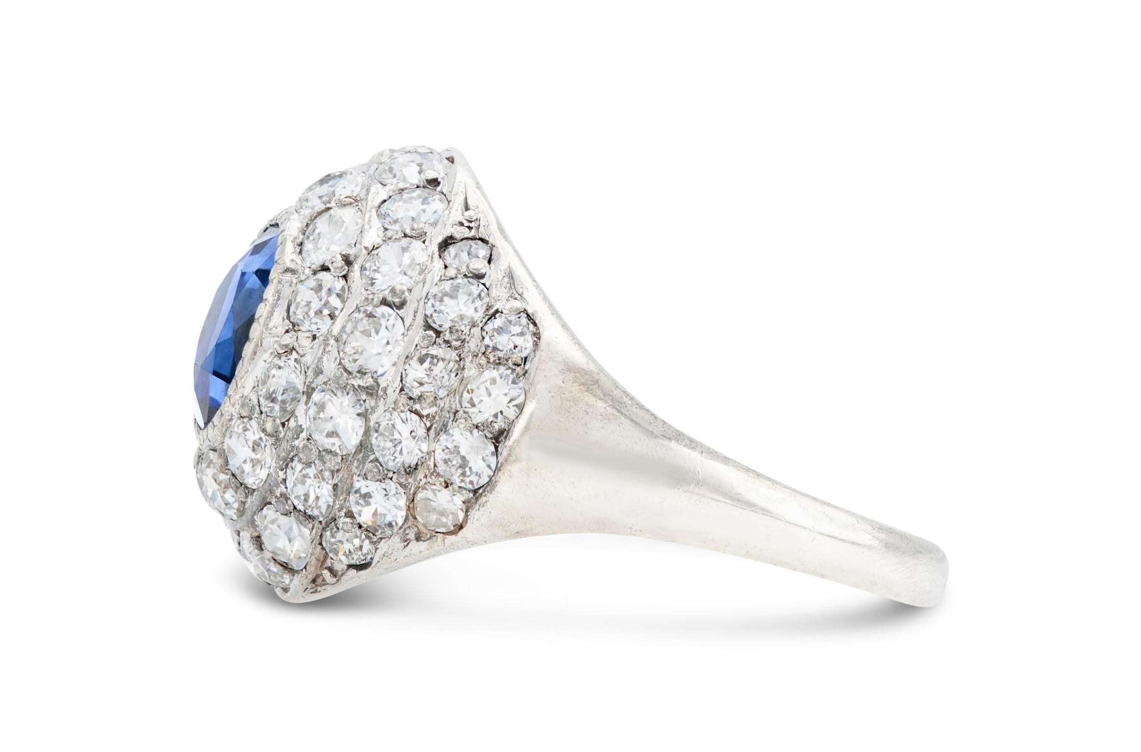 Round Cut Art Deco 0.70 Carat Sapphire and Diamond Bombe Ring For Sale