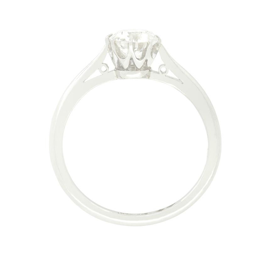 Dating to the Art Deco period, this classic solitaire ring features an old cut diamond at it’s heart. The 0.70 carat stone is of good quality at H in colour and VS2 in clarity. Claw set into a platinum collet and sat upon a slender band of the same