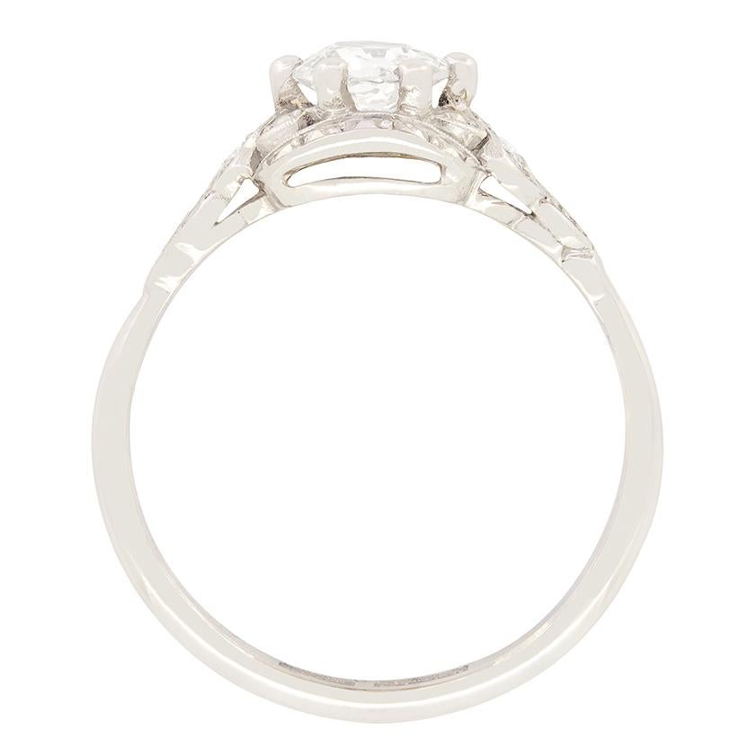 Intricately crafted, this gorgeous take of the timeless solitaire ring was crafted in the 1920s. The art deco piece centres around a 0.70 carat old cut diamond. the diamond have a colour grading of I and a clarity of VS1. The claw set diamond is