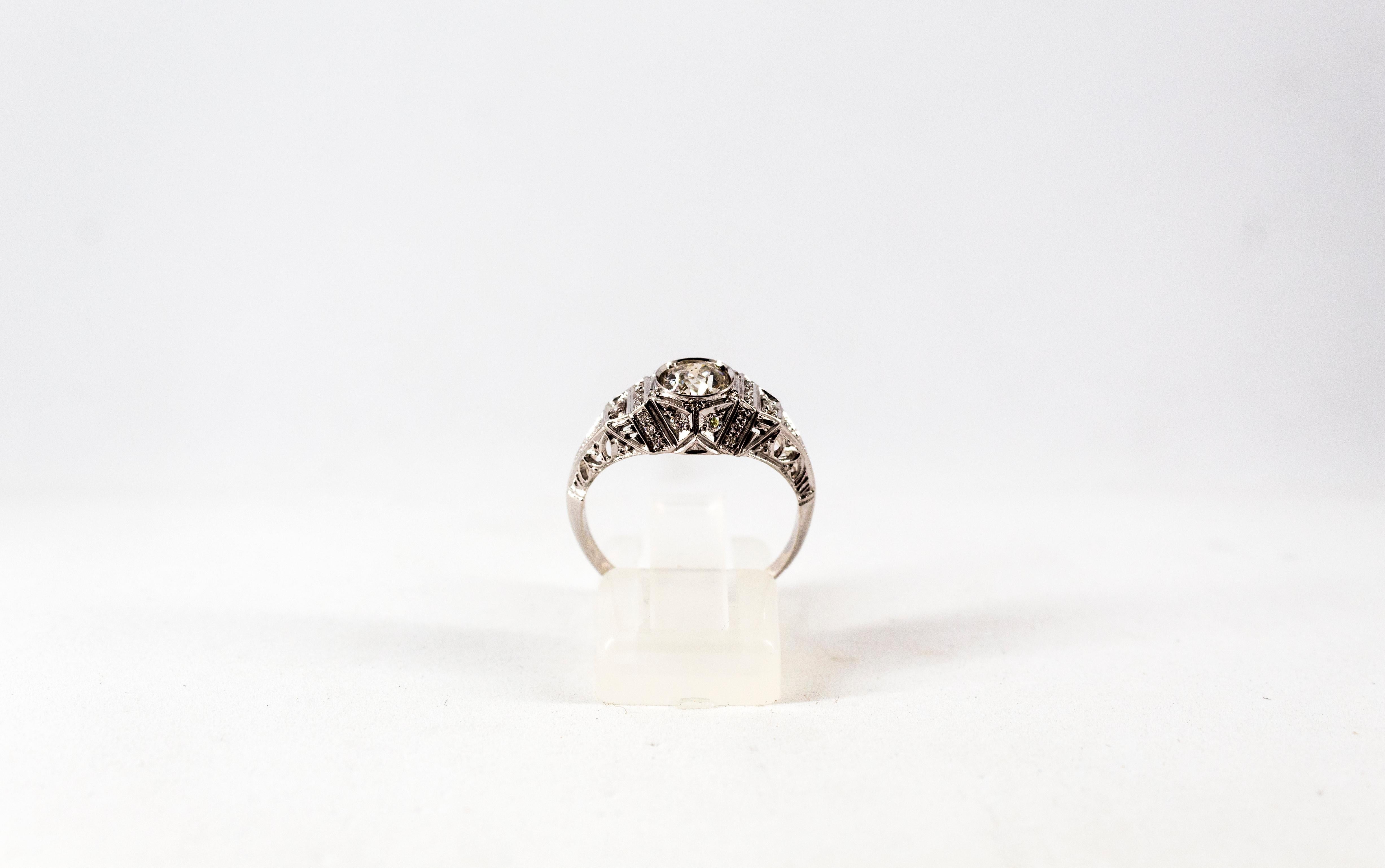 This Ring is made of 18K White Gold.
This Ring has a 0.57 Carats Central White Old European Cut Diamond.
This Ring has 0.16 Carats of White Modern Round Cut Diamonds.

Size ITA: 14 USA: 6 3/4

We're a workshop so every piece is handmade,