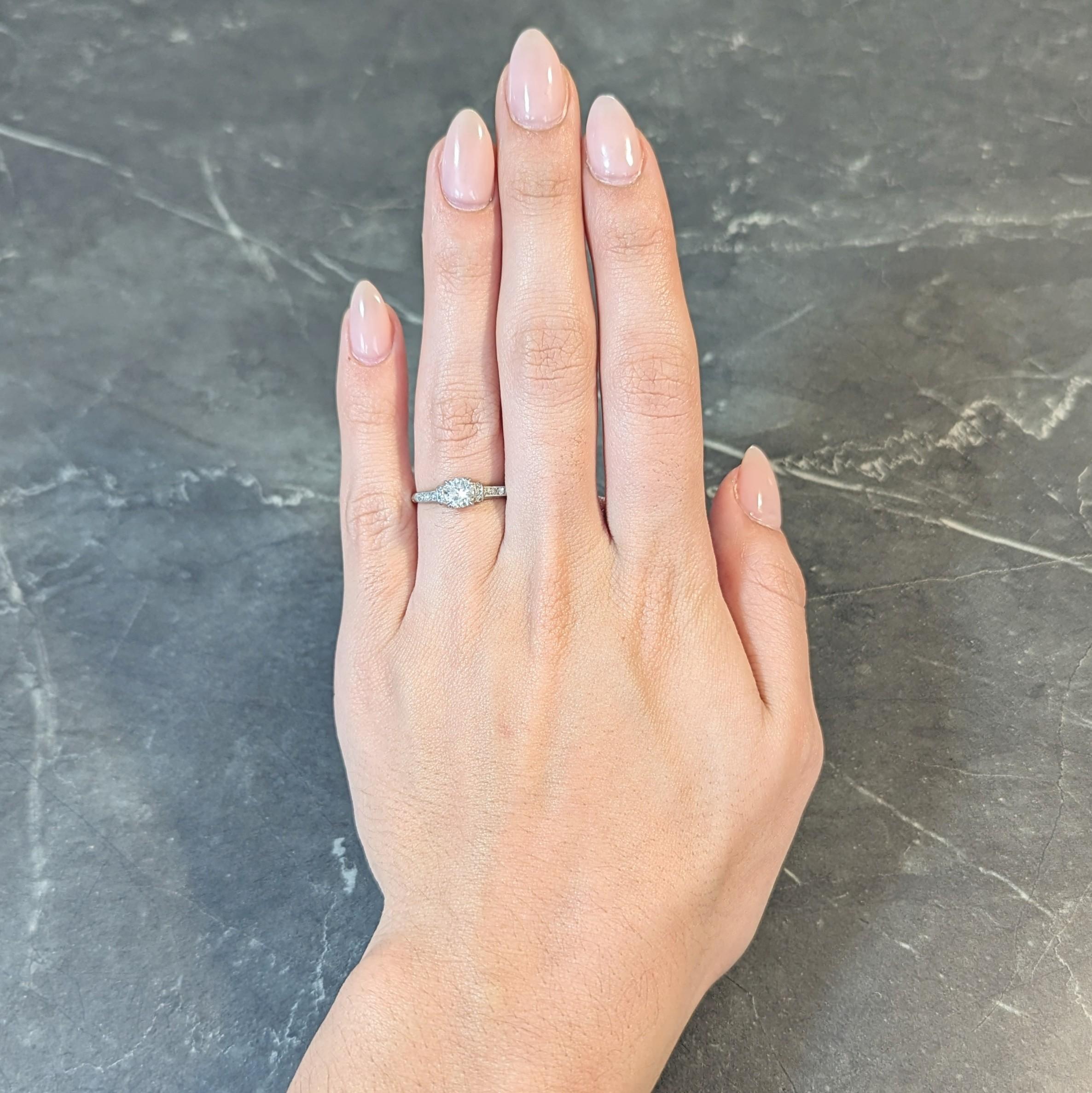 Art Deco 0.74 CTW Transitional Cut Diamond Platinum Arch Engagement Ring For Sale 9