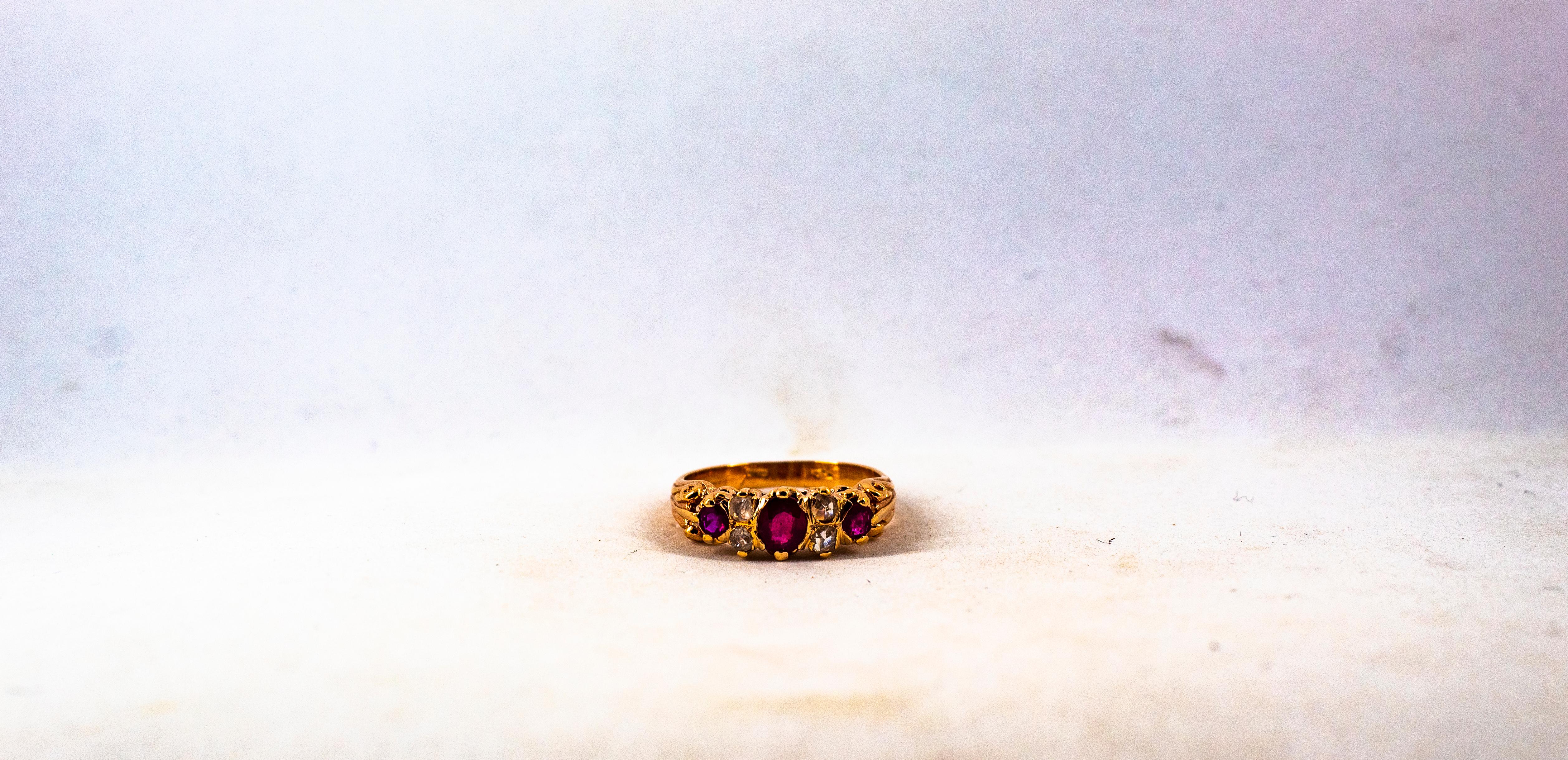 This Ring is made of 9K Yellow Gold.
This Ring has 0.15 Carats of White Rose Cut Diamonds.
This Ring has 0.60 Carats of Oval Cut Rubies.

This Ring is available also in 14 or 18K Yellow or White Gold.
This Ring is available also with Blue Sapphires