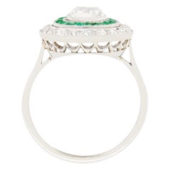 Art Deco 0.80ct Diamond and Emerald Target Ring, c.1920s