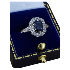 Anello Art-Deco con zaffiro naturale taglio smeraldo e diamante da 0,80 carati in oro 18 carati/platino