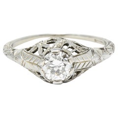 Art Deco 0.81 Carat Diamond 18 Karat White Gold Floral Engagement Ring GIA