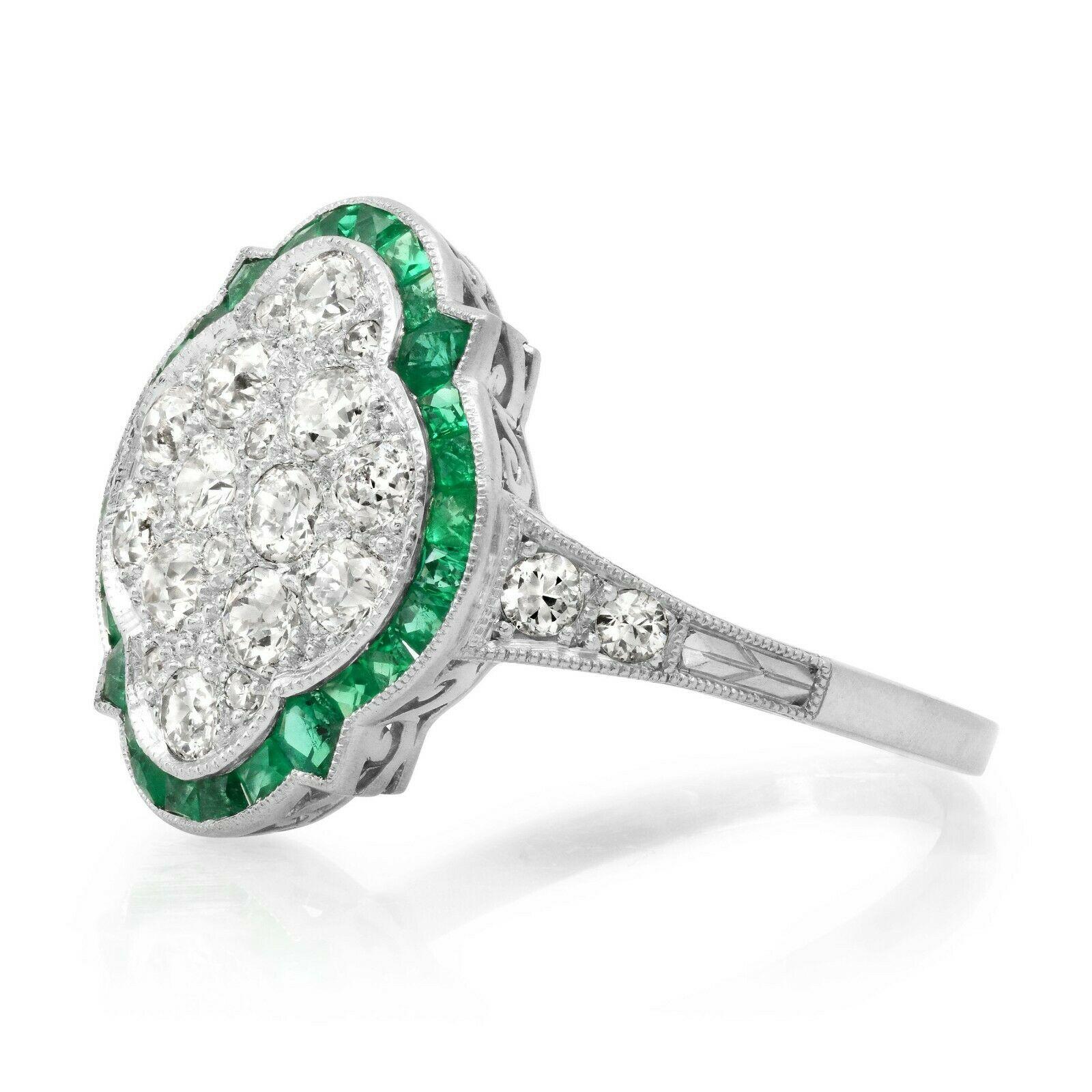 Diamond (0.82 total carat weight) and emerald (0.35 total carat weight) antique inspired cocktail ring in 900 platinum. The ring is designed and handmade locally in Los Angeles by Sage Designs L.A. using earth-mined and conflict free diamonds and