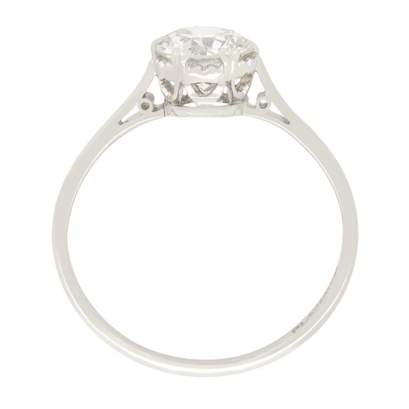 This diamond solitaire ring dates to the 1920s and is the classic engagement ring style. It features a beautiful 0.85 carat transitional cut diamond, claw set at it’s centre. The diamond has been graded G in colour and VS1 clarity and sits proudly