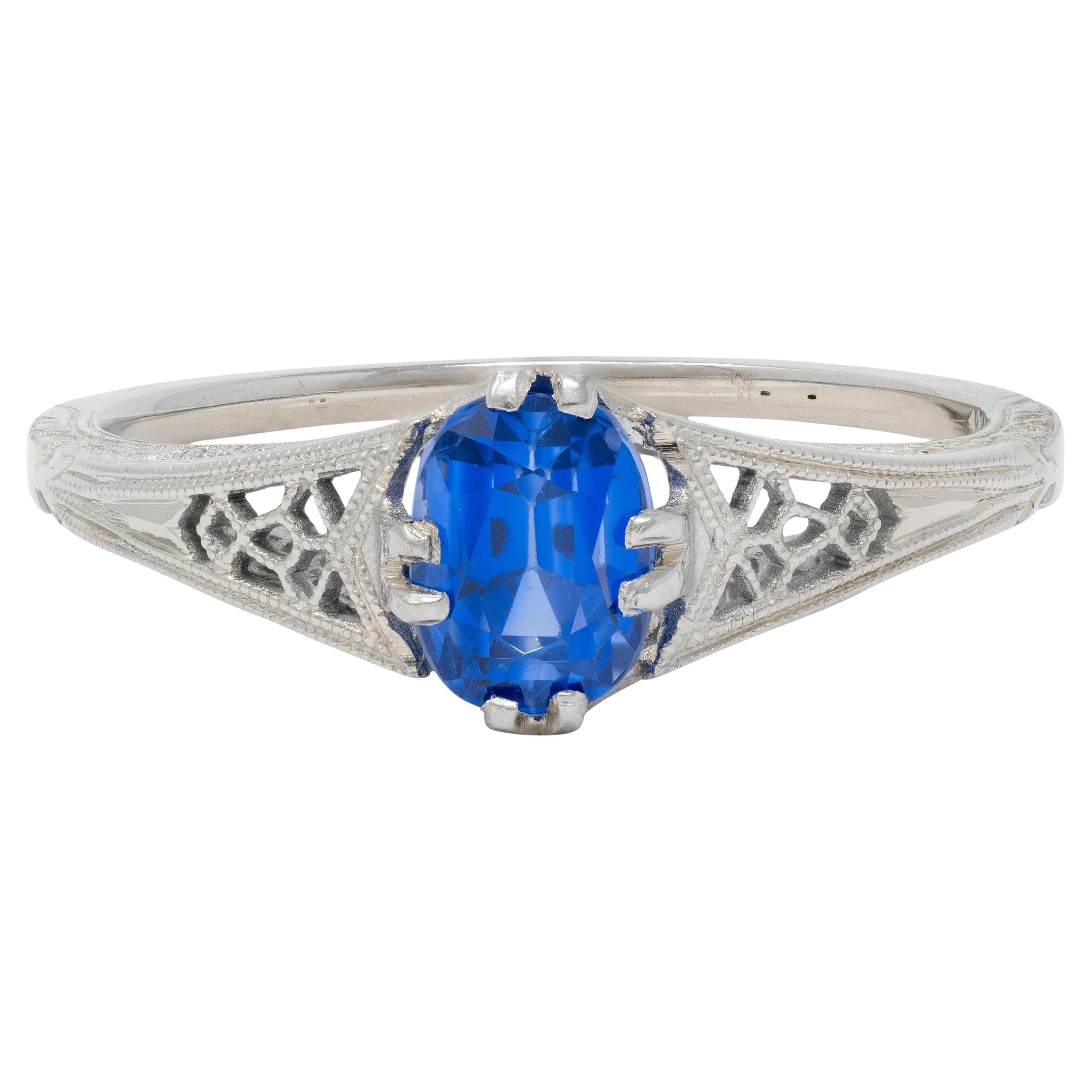 Art Deco 0.93 CTW Oval Cut Sapphire 18 Karat White Gold Vintage Lotus Ring en vente
