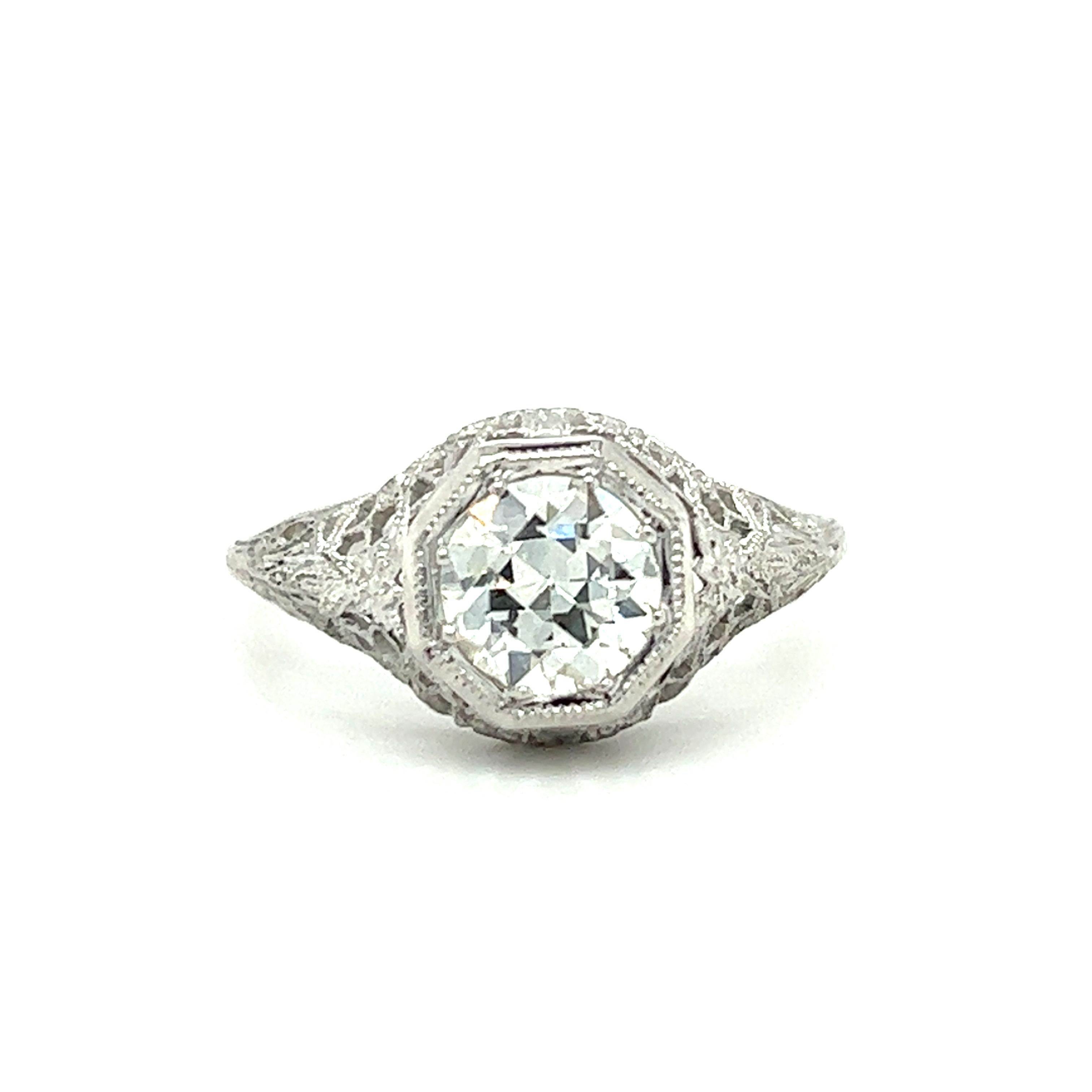 This is an amazing opportunity to own an original 1920s Art Deco filigree ring that was never set or worn.  This setting was acquired from a jeweler who owned it for 100 years and stored it safely.  Our Master craftsman has set this 18-karat white