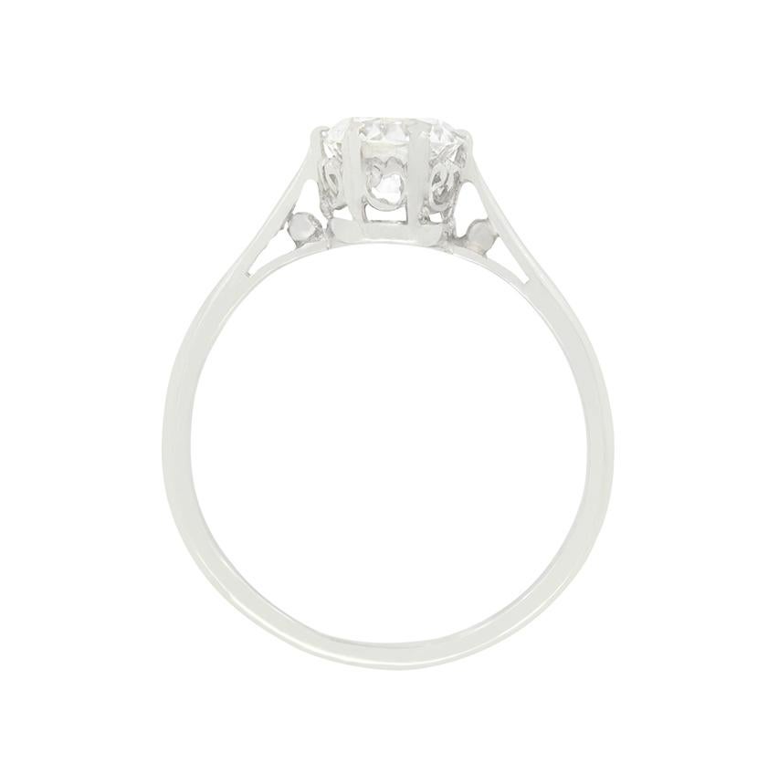 With a timeless design, this beautiful solitaire ring dates back to the Art Deco era. A single old cut diamond is on display at its centre. The 0.97 carat stone has a colour of G and clarity of VS2 and is claw set into a hand crafted platinum