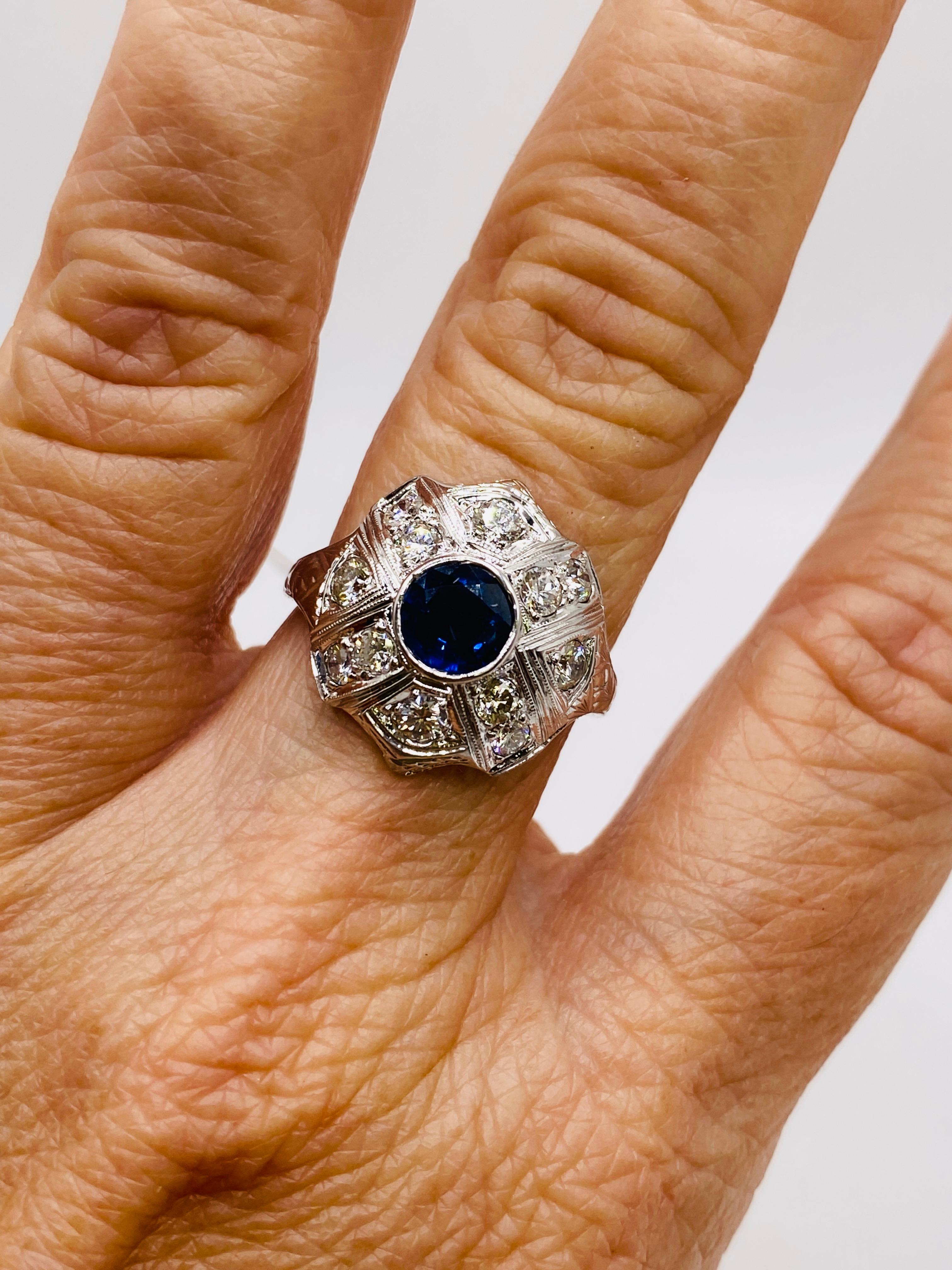 Art Deco 1930's 1.00 carat sapphire and 12 = 0.70 carat total weight diamond 18k white gold ring. Size 7