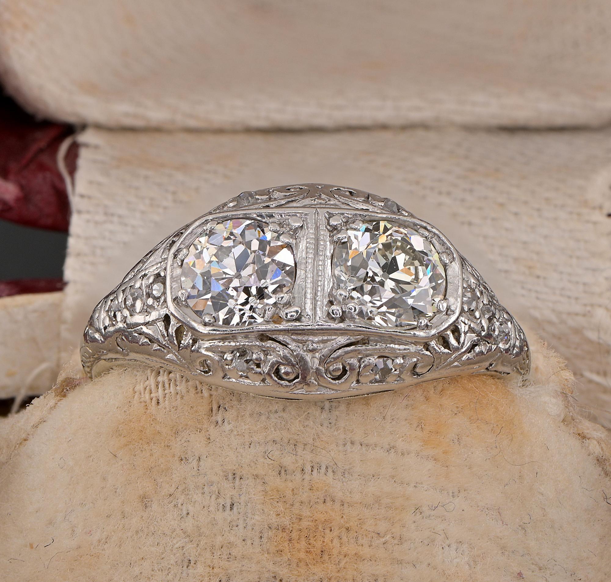 This absolutely gorgeous double Diamond ring is Art Deco period, 1925 ca
Superb filigree work as favorite expression of the Deco period entirely hand made of solid 18 KT gold
The fantastic past artwork is topped by two high quality old cut European