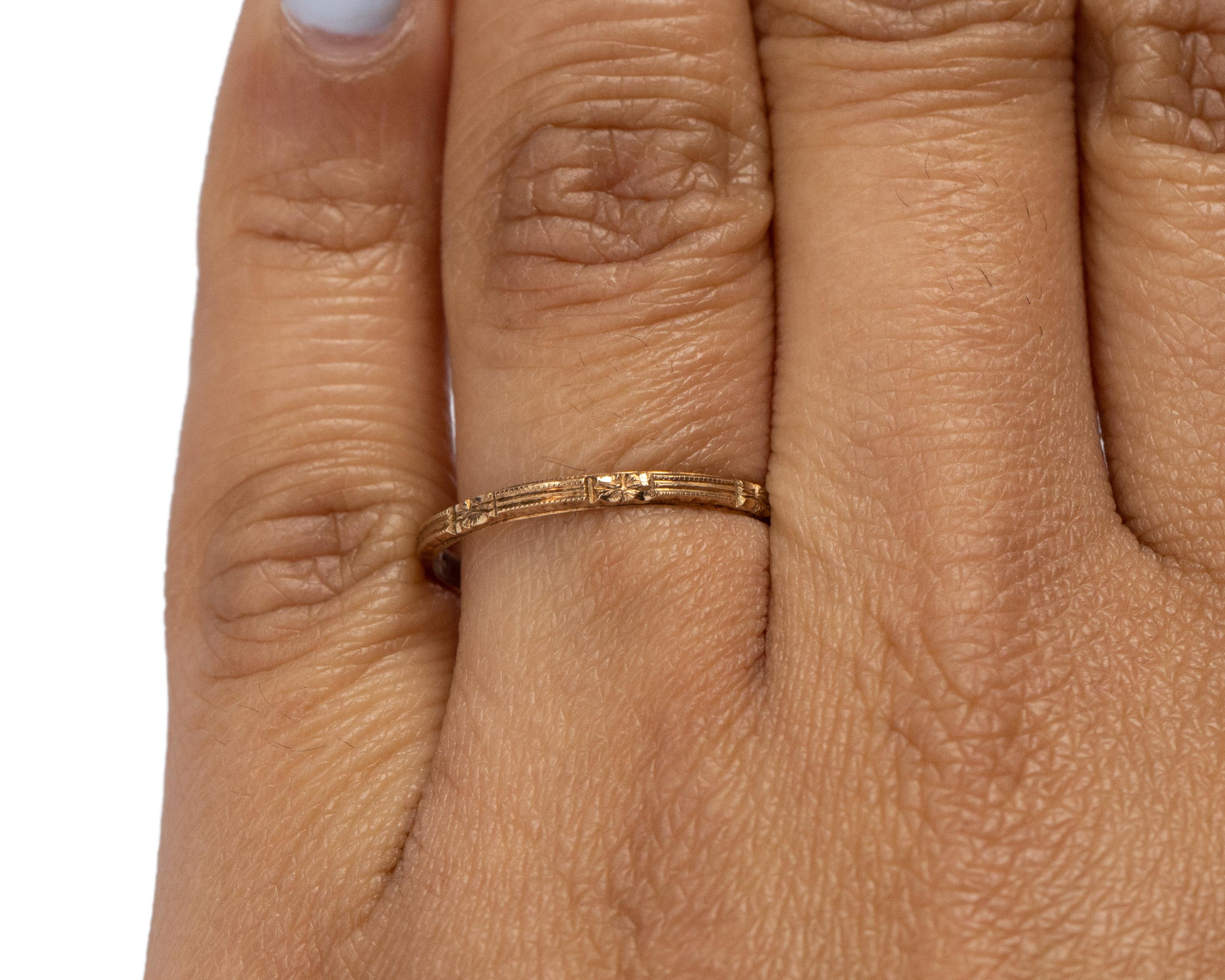 Item Details: 
Ring Size: 7
Metal Type: 10 karat yellow gold [Hallmarked, and Tested]
Weight: 1.0 grams

Finger to Top of Stone Measurement: 1.5 mm
Condition: Excellent