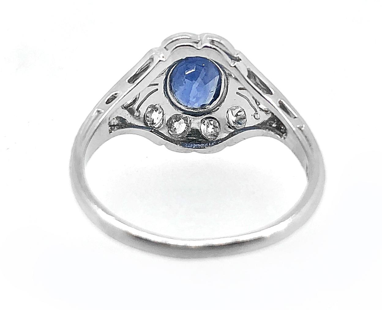 Oval Cut Art Deco 1.00 Carat Diamond and 1.00 Carat T.W. Sapphire Antique Engagement Ring For Sale