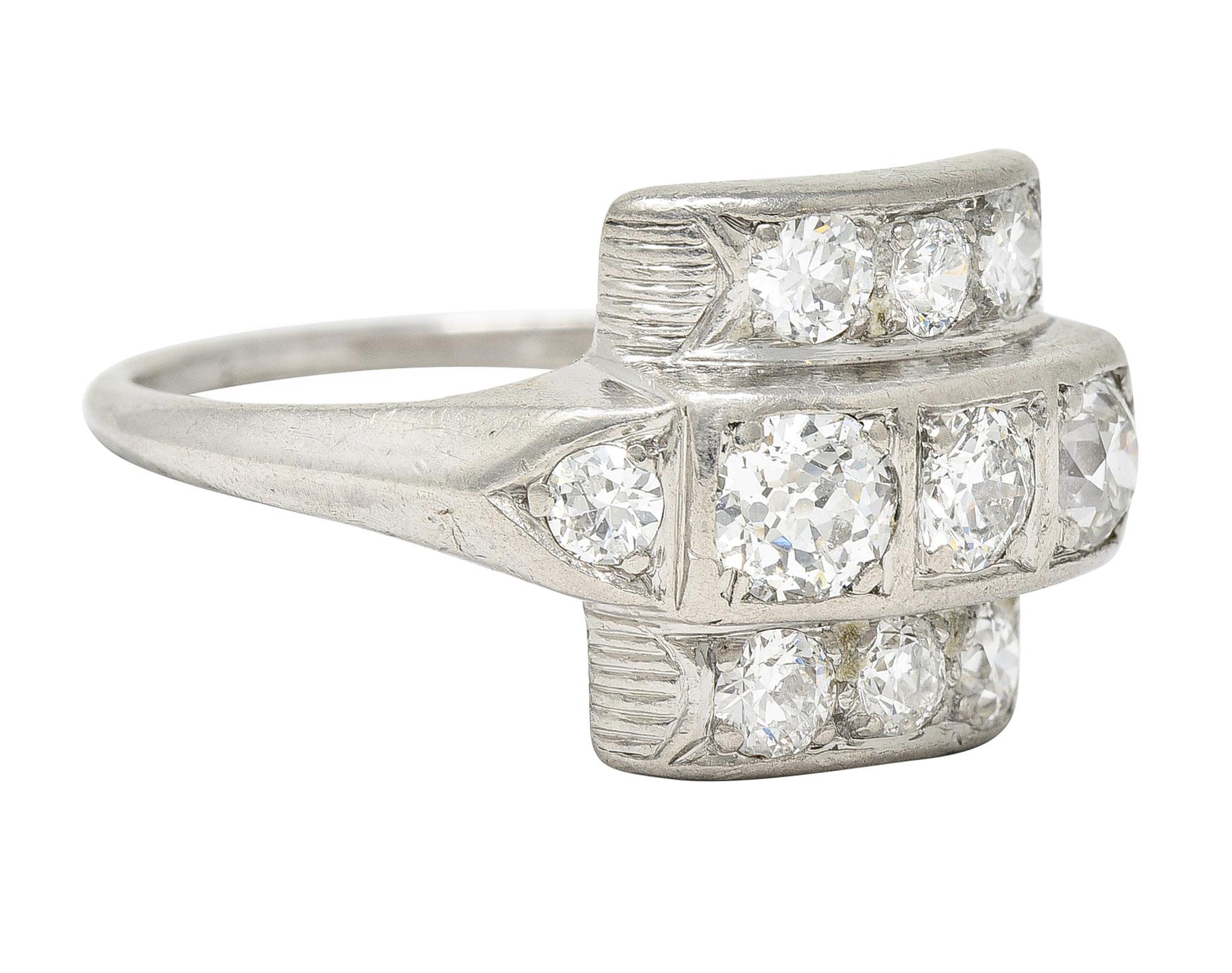 Dinner ring is designed as a tiered square form with three rows of diamonds. Featuring old European cut and transitional cut diamonds. Weighing collectively approximately 1.00 carat - H/I color with SI clarity. Completed by pointed shoulders and a