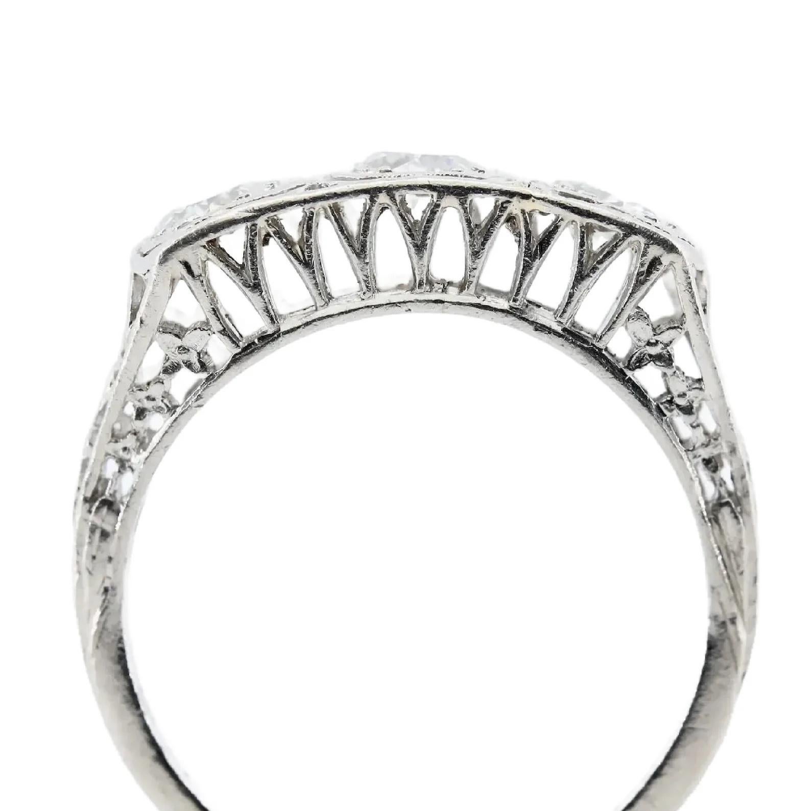 Art Deco 1.00 CTW Three Stone Diamond Filigree & Scroll Work Ring in Platinum In Good Condition For Sale In Boston, MA
