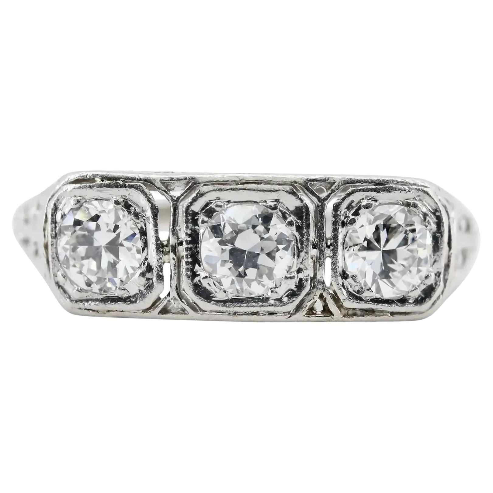 Art Deco 1.00 CTW Three Stone Diamond Filigree & Scroll Work Ring in Platinum For Sale