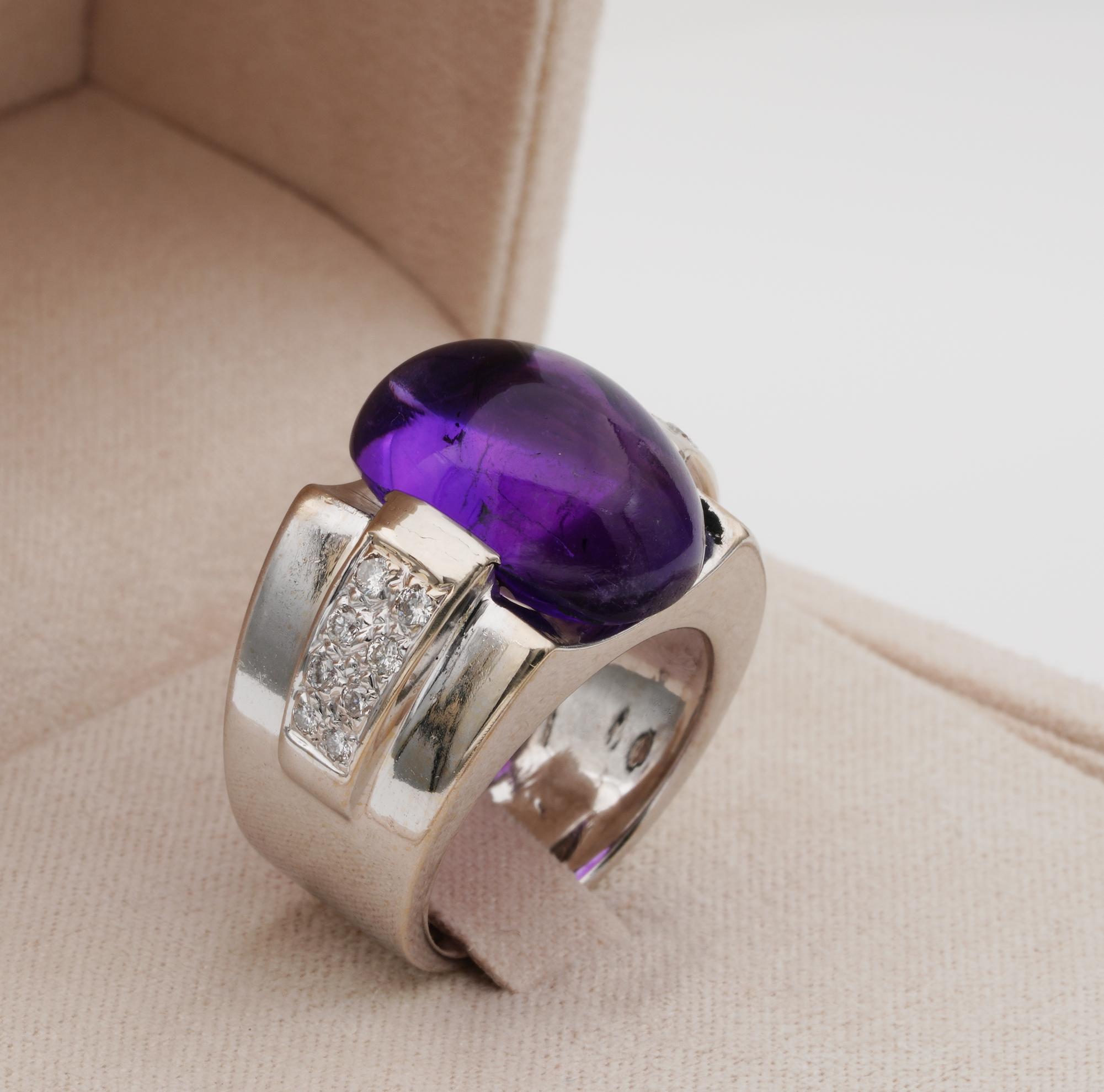 Bold design fabulous Art Deco ring, 18 KT white gold
1930 ca
Hand crafted of solid 18 KT white gold – tested
Centrally set with a large 10.00 Ct. Natural untreated Amethyst cabochon of gorgeous Purple colour
Complemented by line of 16 transitional