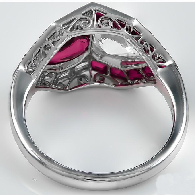 diamond ring with ruby side stones