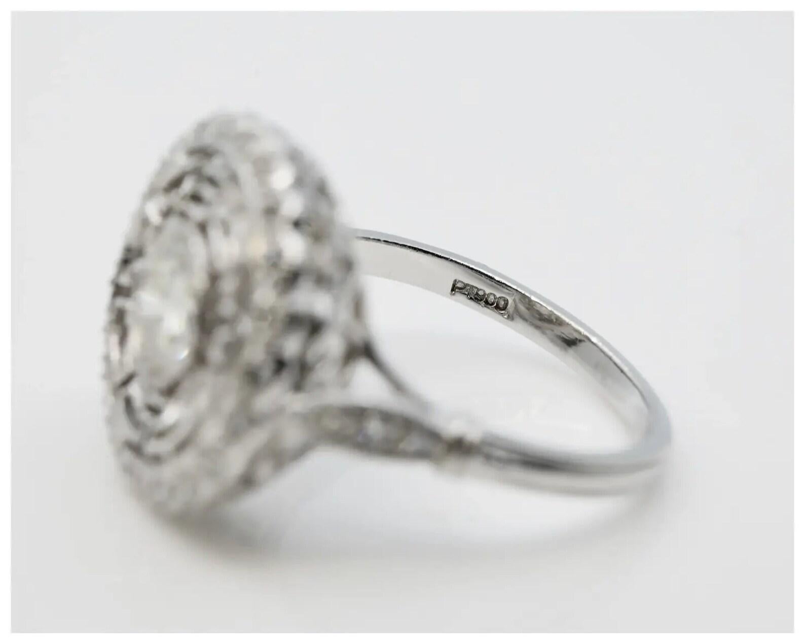 Women's Art Deco 1.02 CTW Greek Key Motif Diamond Engagement Ring in Platinum For Sale