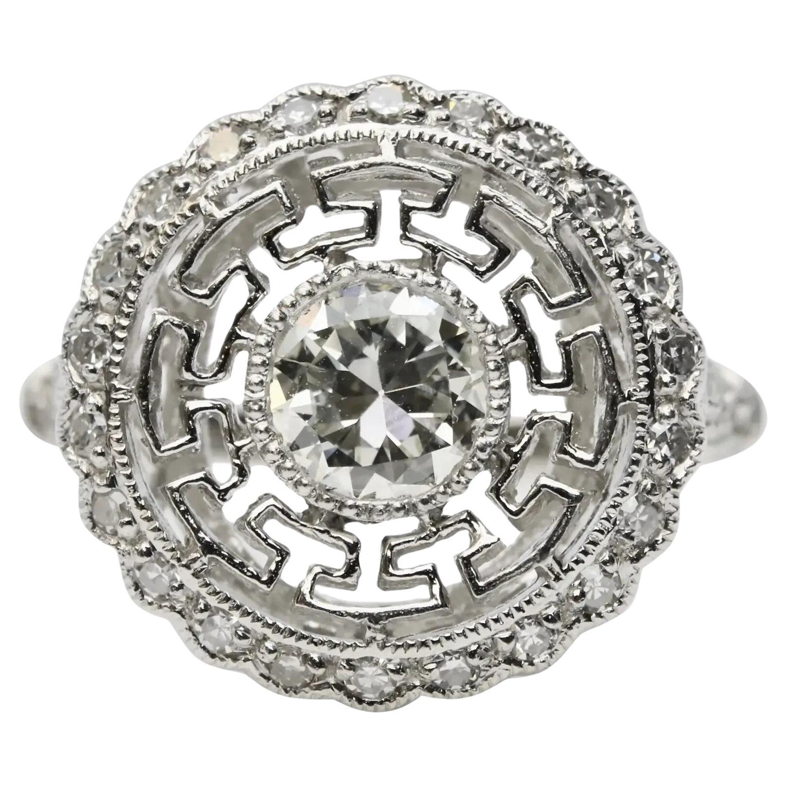 Art Deco 1.02 CTW Greek Key Motif Diamond Engagement Ring in Platinum For Sale