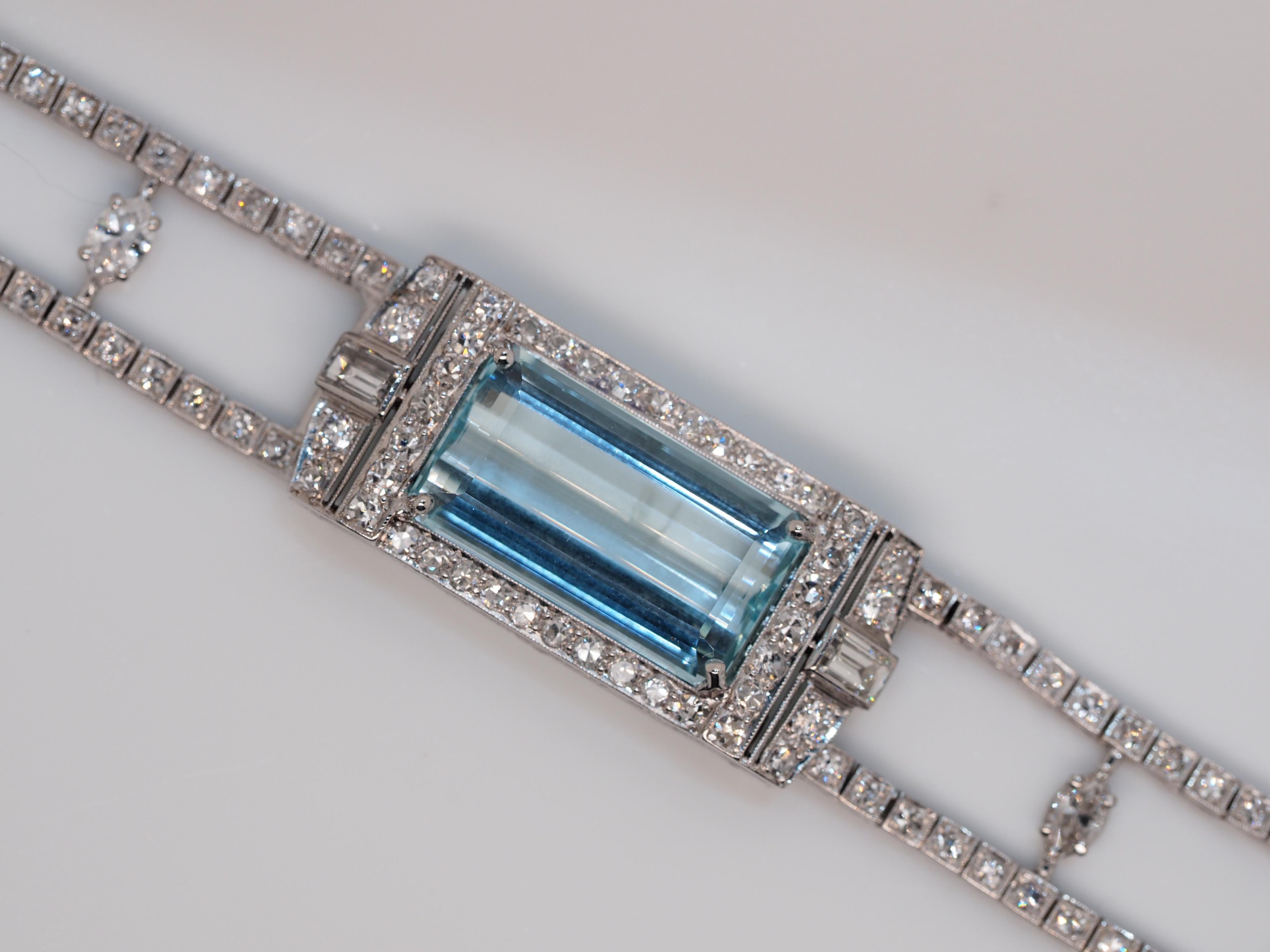 This incredible vintage aquamarine piece dates back to the early 1900's. What was once a watch, has been transformed into an admirable bracelet. The perfect aquamarine center has been set in place where a watch movement once ticked. The center is a