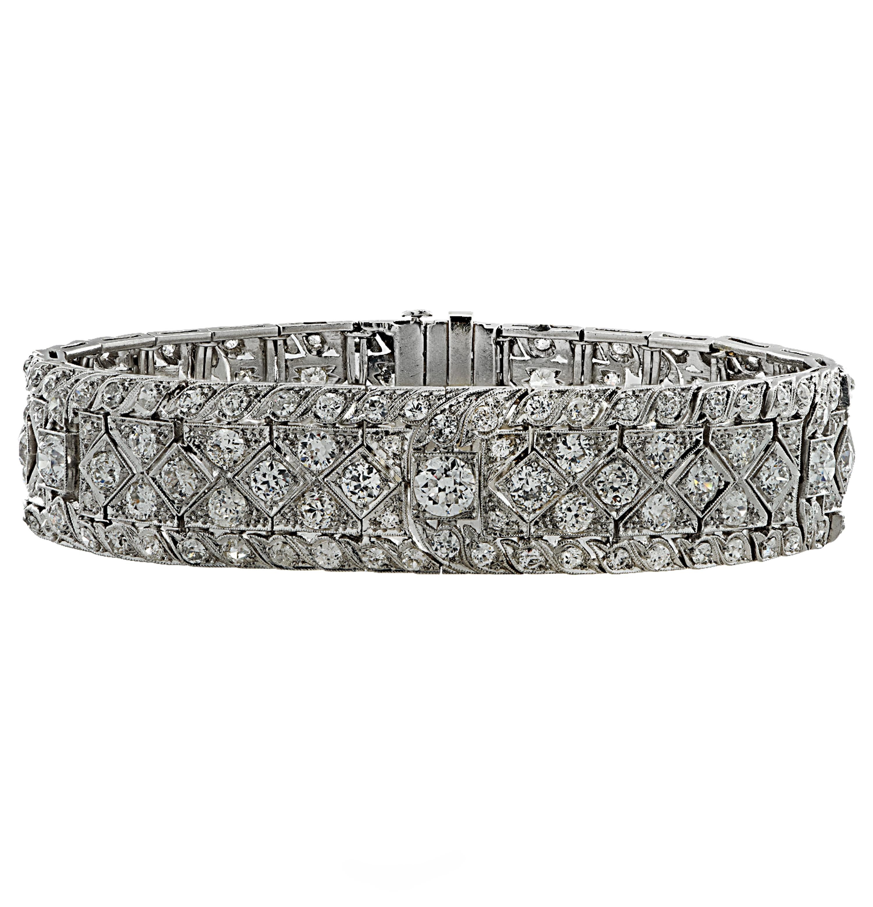 Spectacular Art Deco bracelet crafted in platinum showcasing 182 Old European cut diamonds weighing approximately 10.25 carats total, G-H color, VS-SI clarity. The diamond encrusted openwork plates showcase the diamonds in a magnificent design with