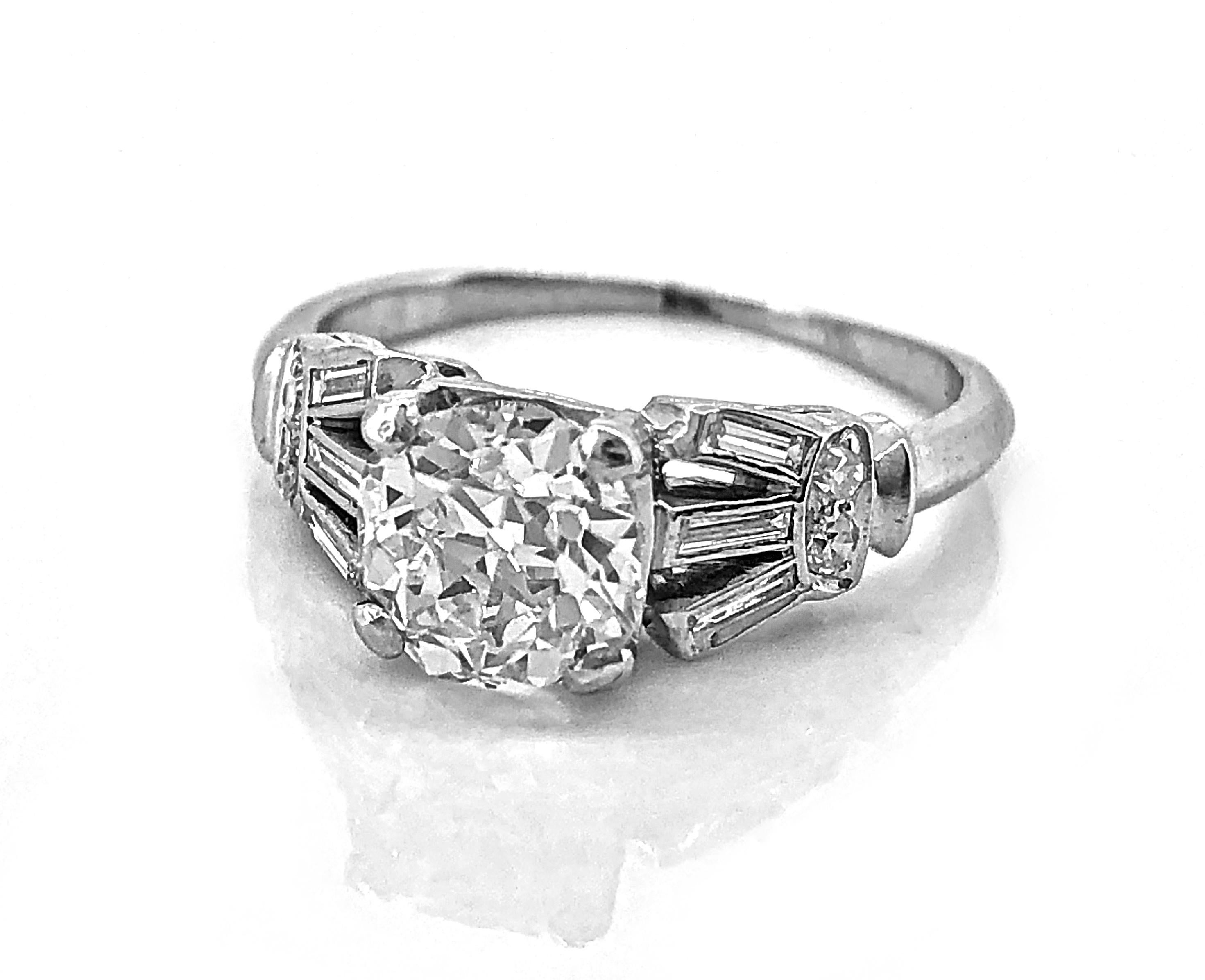 An outstanding 1.05ct. apx. european cut diamond Art Deco Antique engagement ring, crafted in platinum. The center stone features fantastic VS1 clarity and K color, and possesses fire and brilliance. Absolutely sensational!

Primary Stone(s):